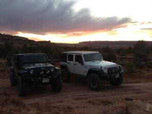 Black and white Jeep in the sunset