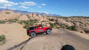 Red Jeep off-roading