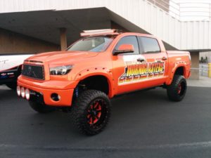 Orange pick up truck