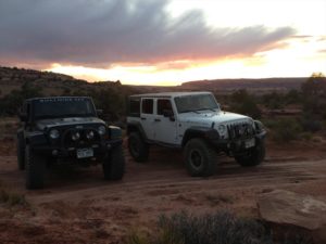 Black and white Jeep in the sunset