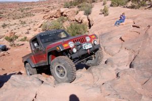 Red Jeep off-roading
